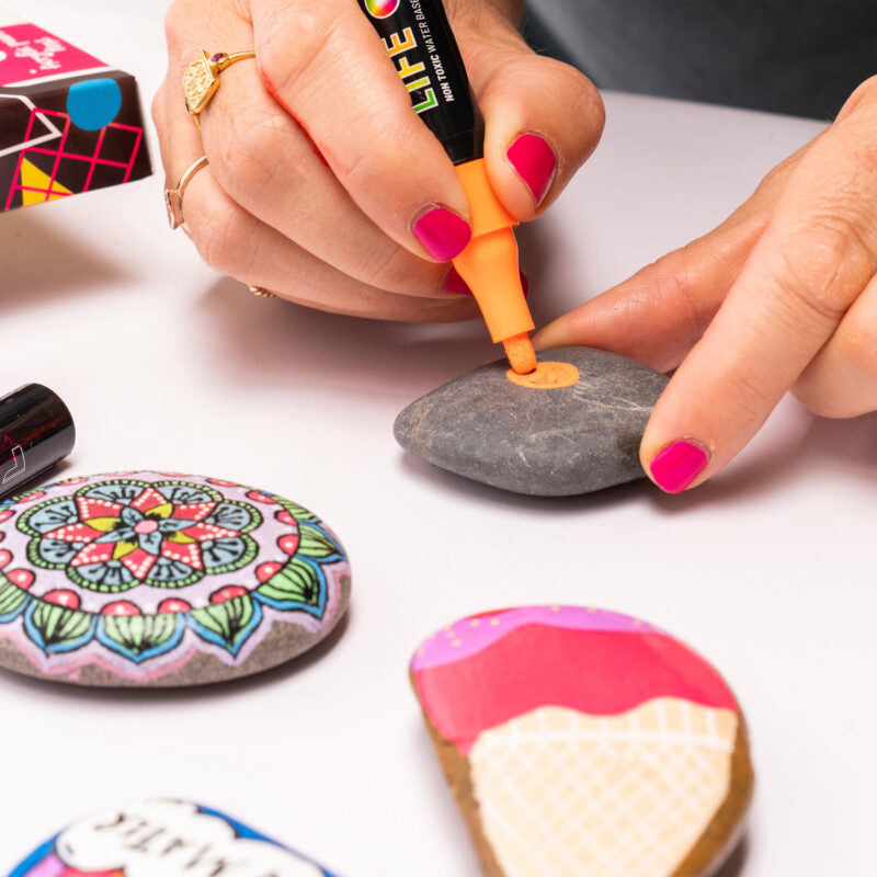 rainbow markers, rainbow paint pens, paint pens, life of colour, rock painting
